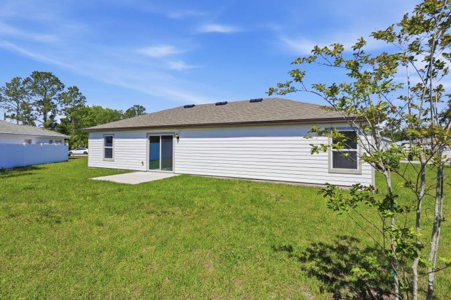 Exterior details and patio area of a home in Palm Coast, Palm Coast (Image 20).