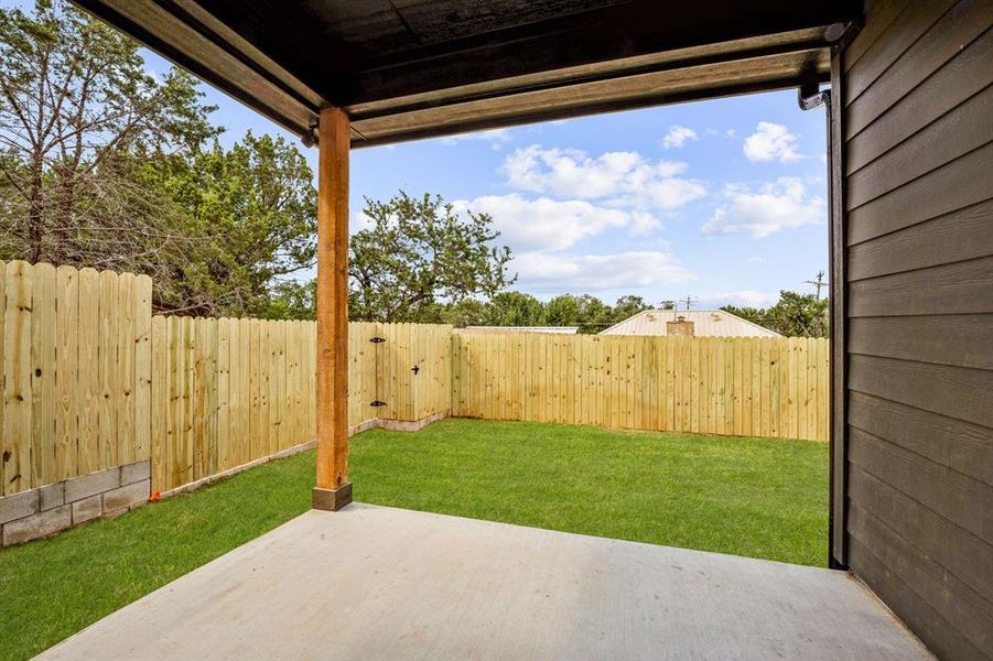 View of yard with a patio