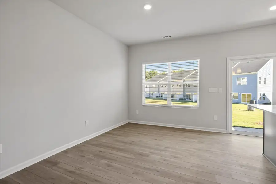 Spacious, unfurnished interior of a new home in West Main Townhomes, Sanford (Image 21).