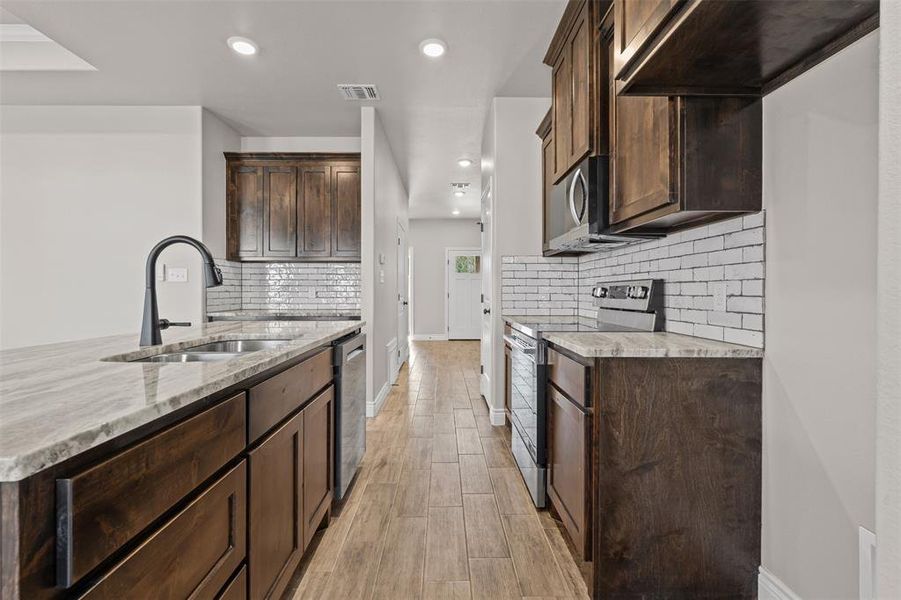 Furnished interior view inside a new home in , Granbury (Image 5). Furnished interior view inside a new home in , Granbury (Image 5).
