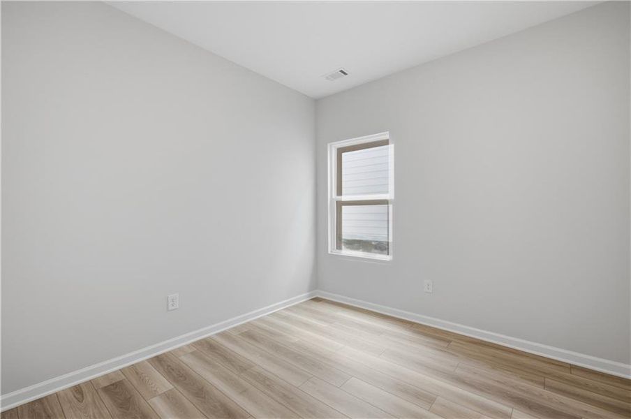 Spacious, unfurnished interior of a new home in The Bluffs, Canton (Image 20).