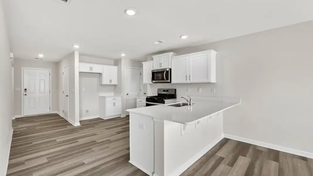 Furnished interior view inside a new home in Waverly Station, Greenwood (Image 7).