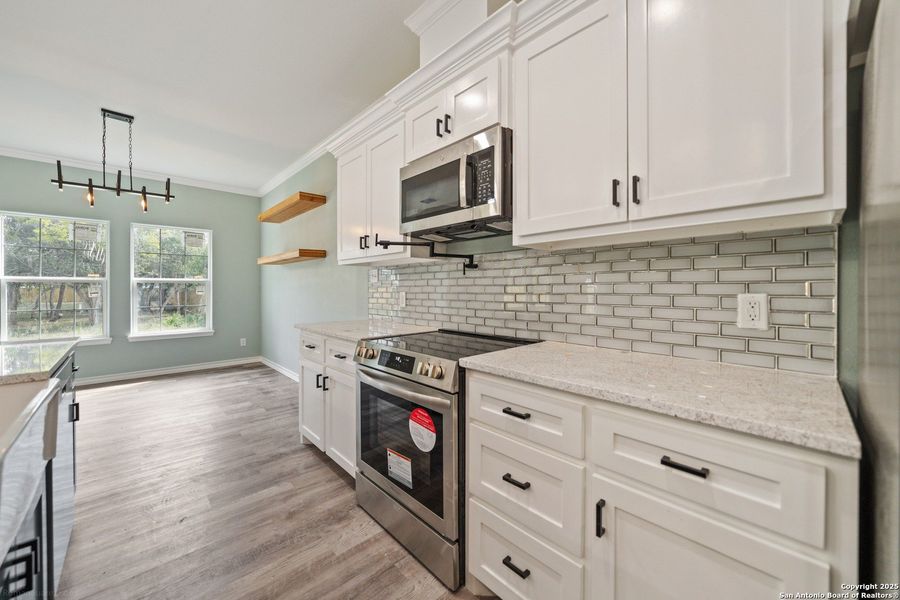 Furnished interior view inside a new home in , Beeville (Image 10).