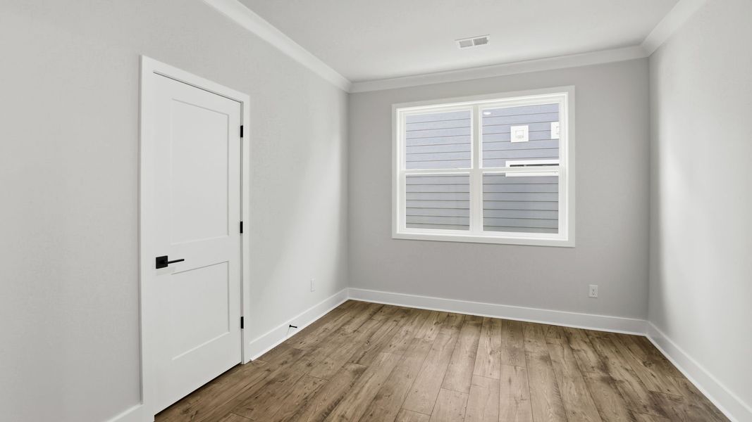 Spacious, unfurnished interior of a new home in Adams Glen, Greenville (Image 23).