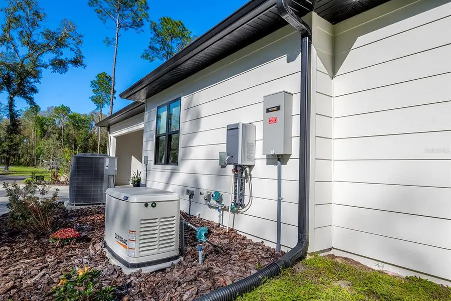Exterior details and patio area of a home in , High Springs (Image 4).