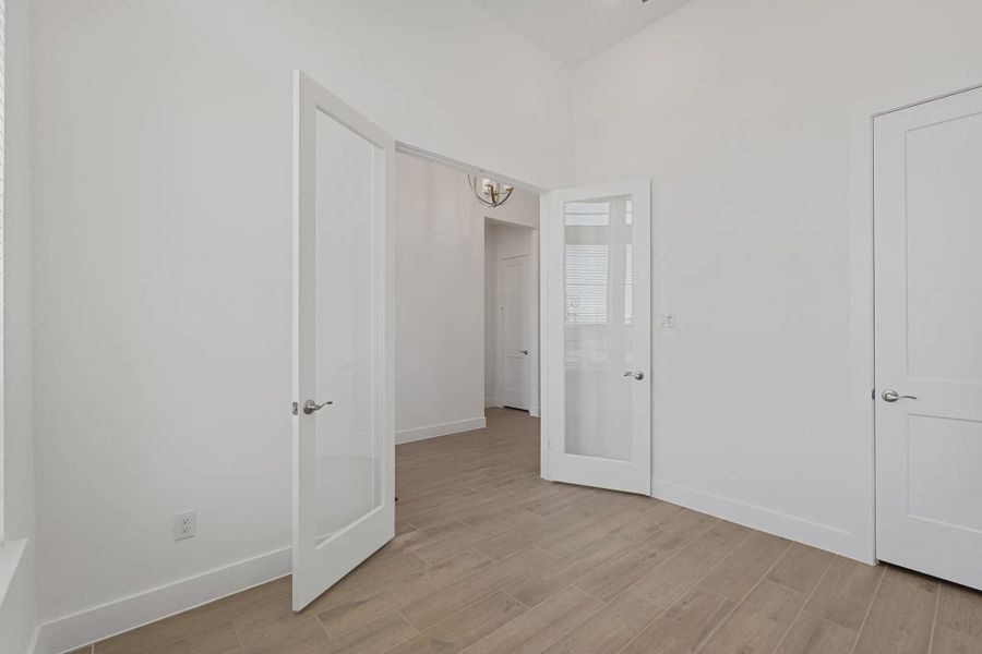 Representative unfurnished interior of a home built from the Brentwood by Chesmar Homes in Meridiana 50's and 60's, Manvel (Image 27).