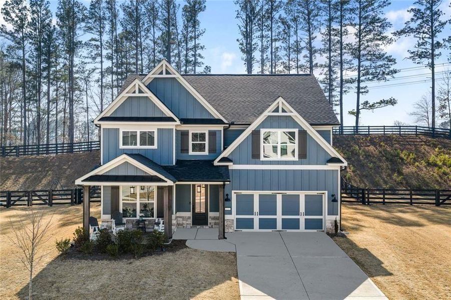Front exterior of a new home in , Dallas, GA, highlighting curb appeal (Image 25).