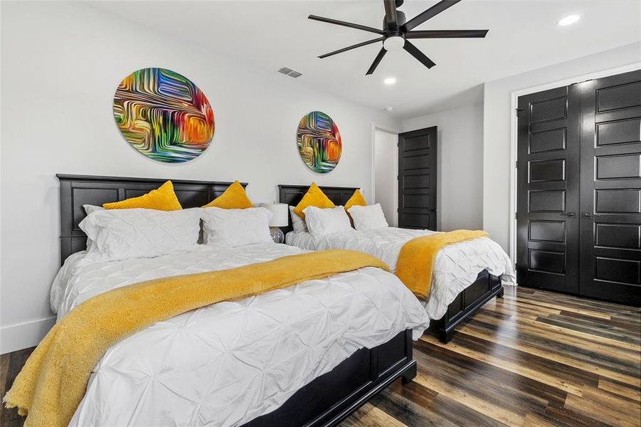 It doesn't look like a secondary bedroom with 2 queen beds and room to spare!