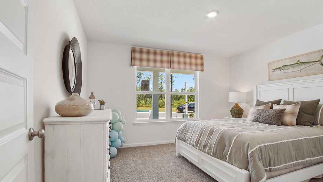 Furnished interior view inside a new home in Ashton Park Phase III, Freeport (Image 14).