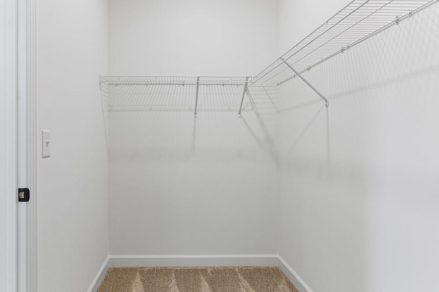 A white staircase in a room.