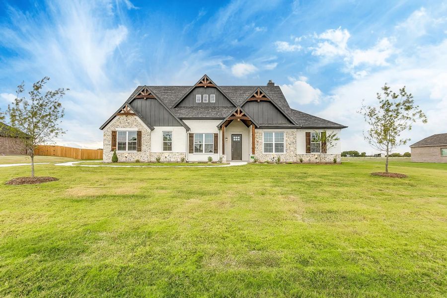 Representative exterior photo of a completed home built from the The Finley by Elmwood Custom Homes in Matthews Farm, Venus, TX (Image 3). Representative exterior photo of a completed home built from the The Finley by Elmwood Custom Homes in Matthews Farm, Venus, TX (Image 3).