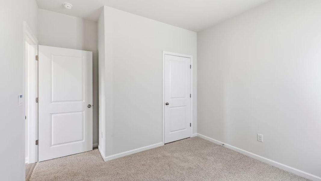 Spacious, unfurnished interior of a new home in Benjamin's Grove, Woodruff (Image 18).