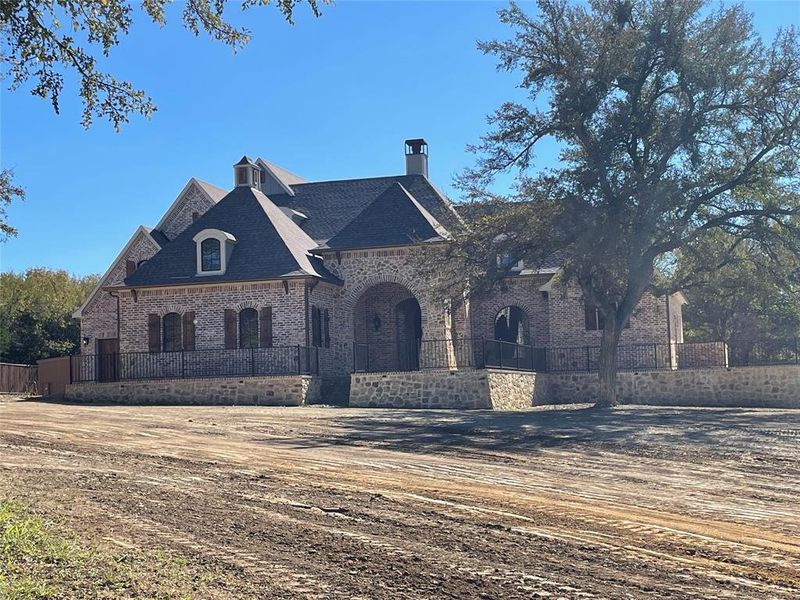 Exterior details and patio area of a home in , Sherman (Image 15). Exterior details and patio area of a home in , Sherman (Image 15).
