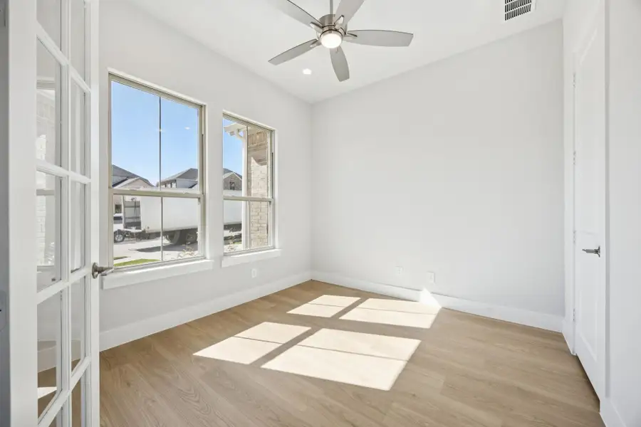 Representative unfurnished interior of a home built from the Kenai by Centre Living Homes in Painted Tree Lakeside, McKinney (Image 28).