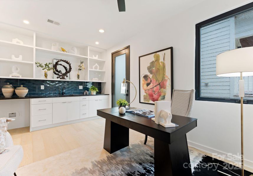 First floor bedroom with en suite bathroom, kitchenette, secondary laundry hook up & private entrance/exit.