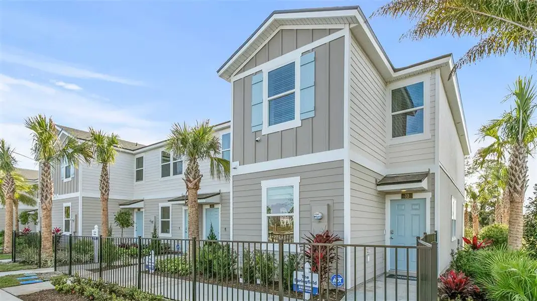 Front exterior of a new home in Stokes Landing, St. Augustine, FL, highlighting curb appeal (Image 1). Front exterior of a new home in Stokes Landing, St. Augustine, FL, highlighting curb appeal (Image 1).