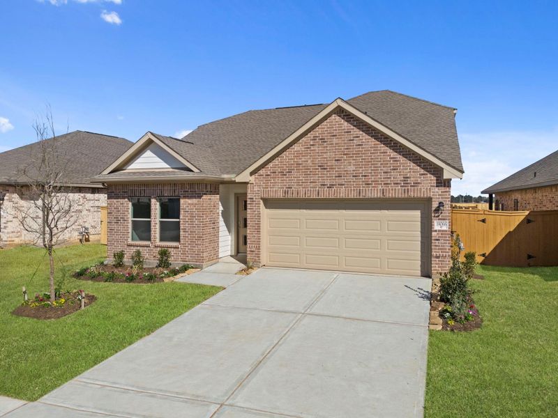 Front exterior of a new home in Cypress Green, Hockley, TX, highlighting curb appeal (Image 16).