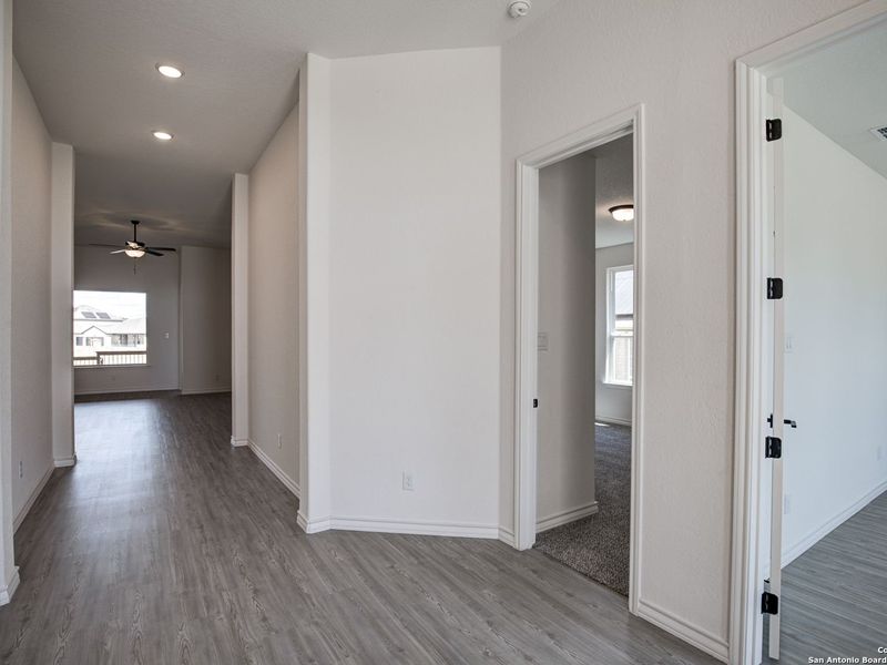 Spacious, unfurnished interior of a new home in The Reserve at Potranco Oaks, Castroville (Image 21).