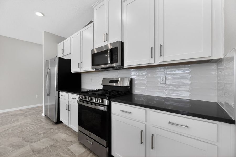 Representative furnished interior of a home built from the Bellflower by Taylor Morrison in Cherry Elm at SilverLeaf, St. Augustine (Image 7).