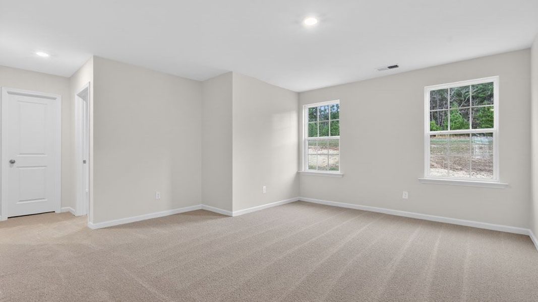 Spacious, unfurnished interior of a new home in Gretchen Pines, West End (Image 24).