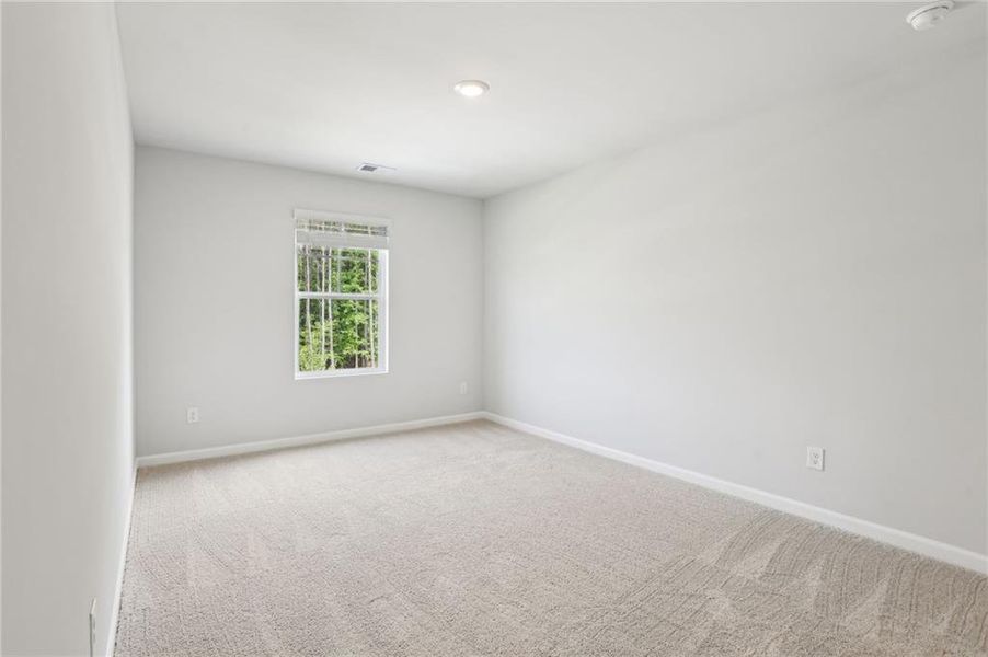 Spacious, unfurnished interior of a new home in The Hills at Cedar Creek, Winder (Image 17).
