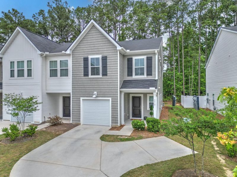 Front exterior of a new home in , Charleston, SC, highlighting curb appeal (Image 25).