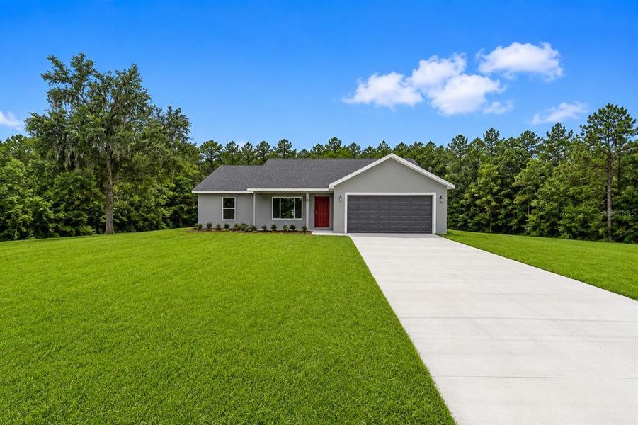Front exterior of a new home in , Dunnellon, FL, highlighting curb appeal (Image 25). Front exterior of a new home in , Dunnellon, FL, highlighting curb appeal (Image 25).
