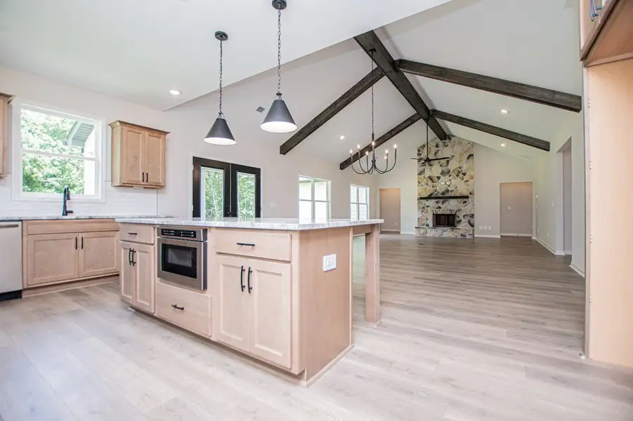 Furnished interior view inside a new home in WOODMONT RESERVE, Roopville (Image 6).
