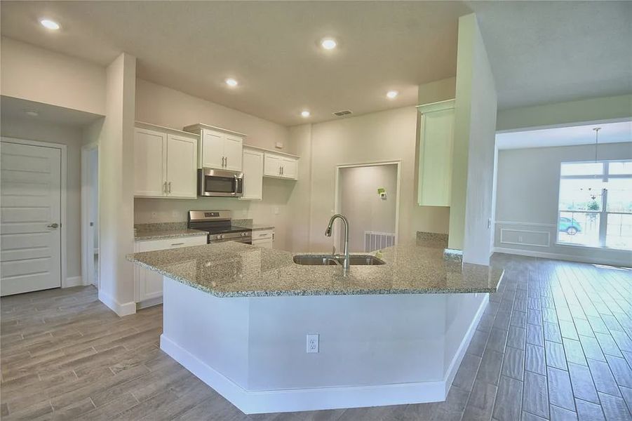 Furnished interior view inside a new home in Lake Juliana Estates, Auburndale (Image 6).