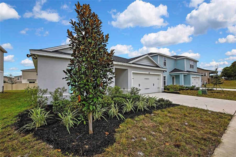 Front exterior of a new home in , Sumterville, FL, highlighting curb appeal (Image 29).