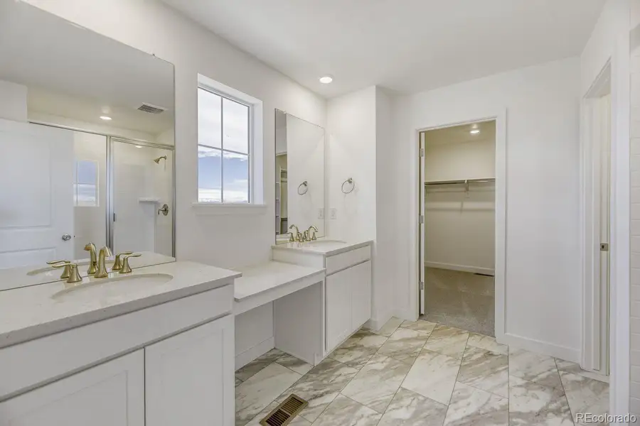 Furnished interior view inside a new home in Vermilion Creek, Centennial (Image 5).