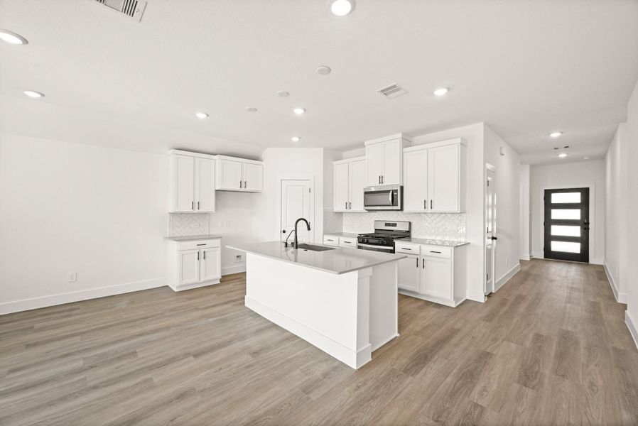 Furnished interior view inside a new home in Newport Pointe, Crosby (Image 6).