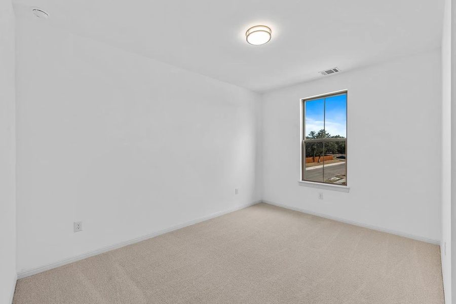 Spacious, unfurnished interior of a new home in Parmer Ranch 60, Georgetown (Image 14).