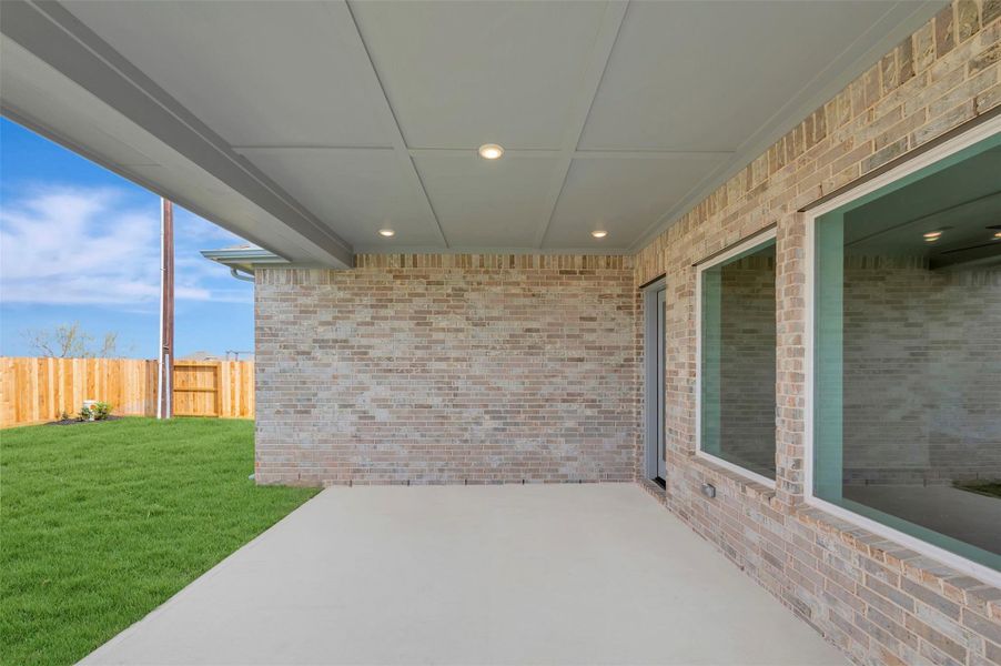 Exterior details and patio area of a home in Jordan Ranch - Terrace Collection, Fulshear (Image 3).