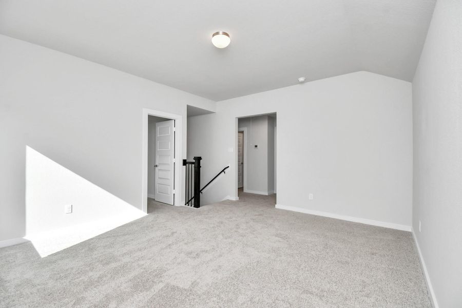 Come upstairs and enjoy a day of leisure in this fabulous game room! This is the perfect hangout spot or adult game room! Features plush carpet, high ceilings, custom paint and windows for plenty of natural light. Come upstairs and enjoy a day of leisure in this fabulous game room! This is the perfect hangout spot or adult game room! Features plush carpet, high ceilings, custom paint and windows for plenty of natural light.