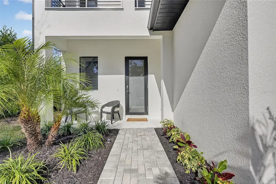Exterior details and patio area of a home in , Sarasota (Image 3).