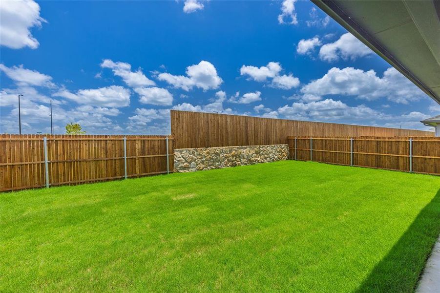 Front exterior of a new home in Stratton Place, Greenville, TX, highlighting curb appeal (Image 2).