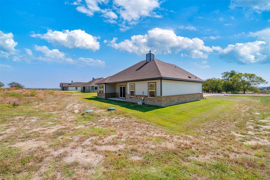 Exterior details and patio area of a home in , Azle (Image 4).