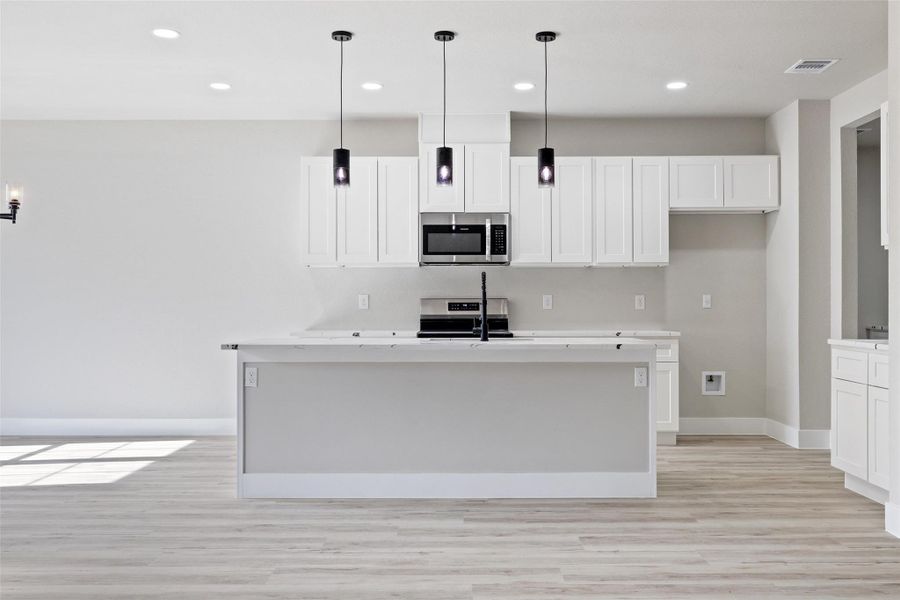 Please note: Photos shown are not of the actual homes but are of the same floorplan. Finishes and features may vary. Please note: Photos shown are not of the actual homes but are of the same floorplan. Finishes and features may vary.