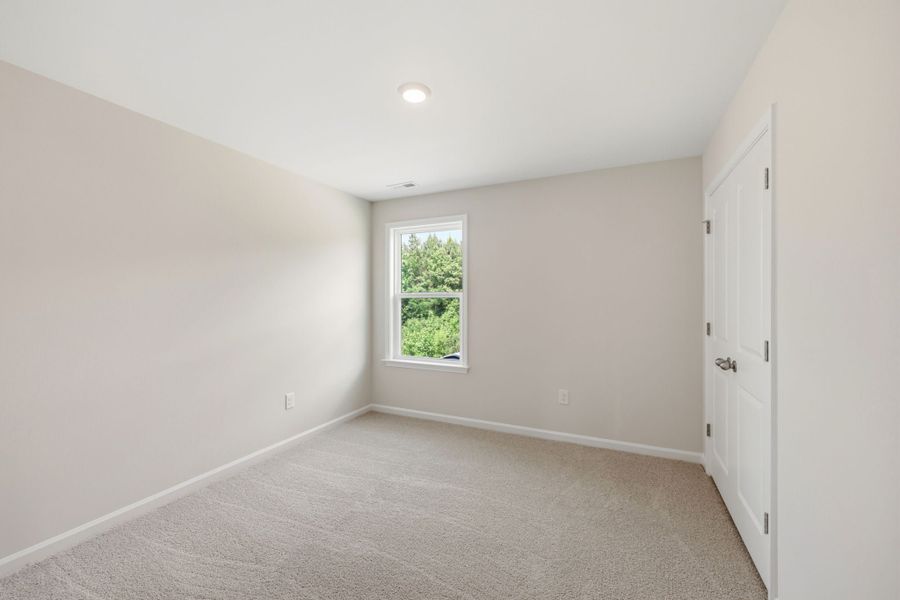 Spacious, unfurnished interior of a new home in The Farm at Neill's Creek, Lillington (Image 29).