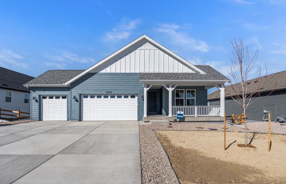 Front exterior of a new home in Independence, Elizabeth, CO, highlighting curb appeal (Image 2).