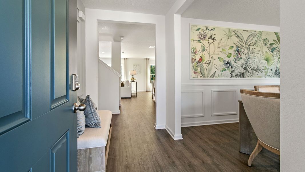 Representative furnished interior of a home built from the HAYDEN II by D.R. Horton in Copes Landing, Jacksonville (Image 5).