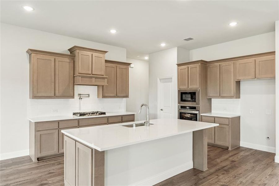 Furnished interior view inside a new home in Stone River Glen 60s, Royse City (Image 11).