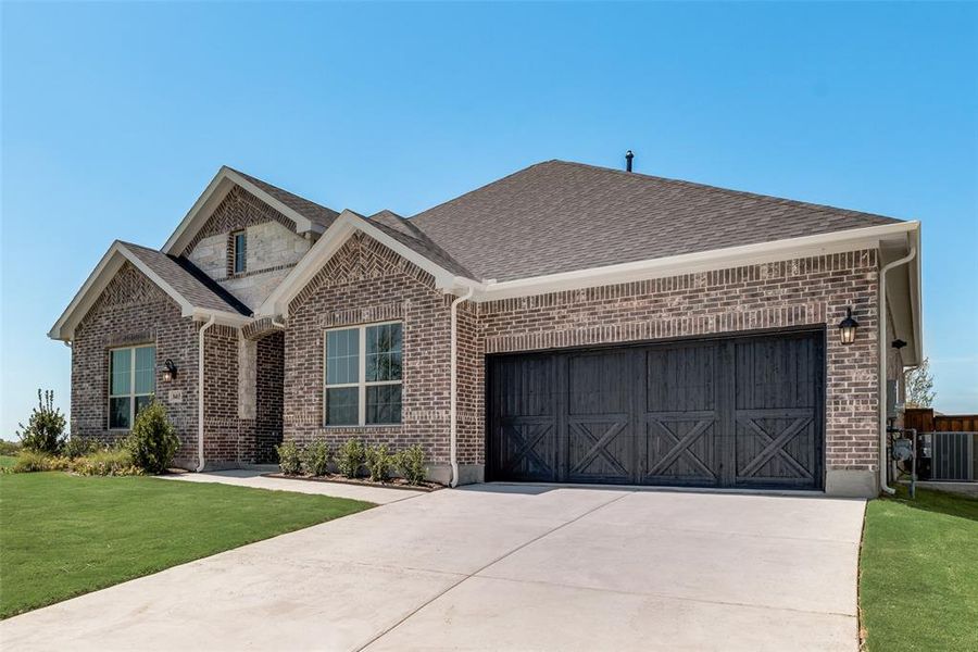 Front exterior of a new home in Villages of Creekwood, Frisco, TX, highlighting curb appeal (Image 2). Front exterior of a new home in Villages of Creekwood, Frisco, TX, highlighting curb appeal (Image 2).