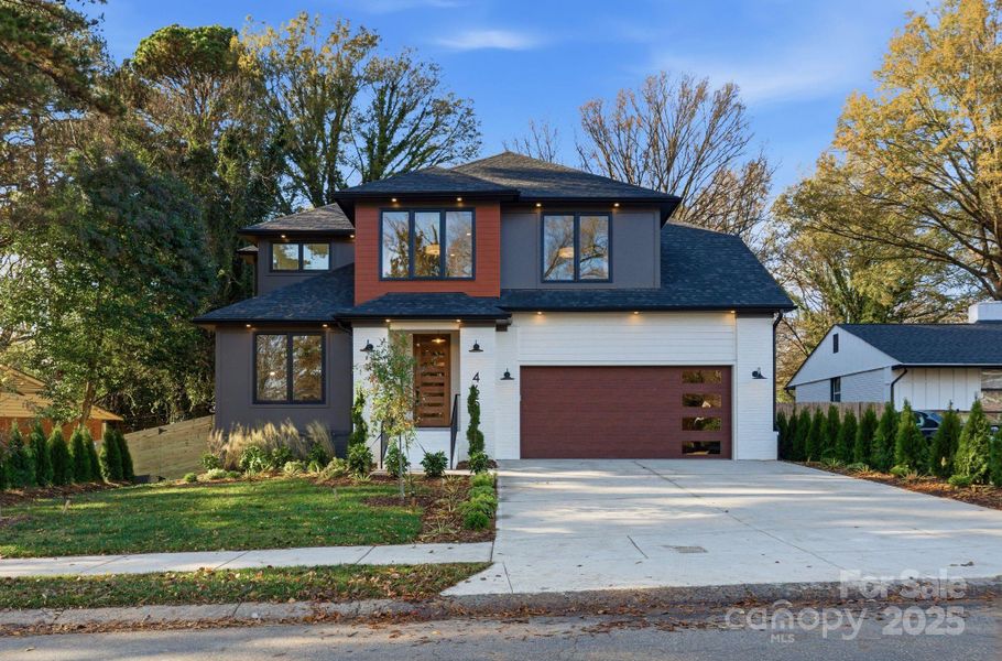 Front exterior of a new home in , Charlotte, NC, highlighting curb appeal (Image 25).