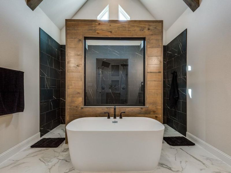 Bathroom with independent shower and bath and vaulted ceiling