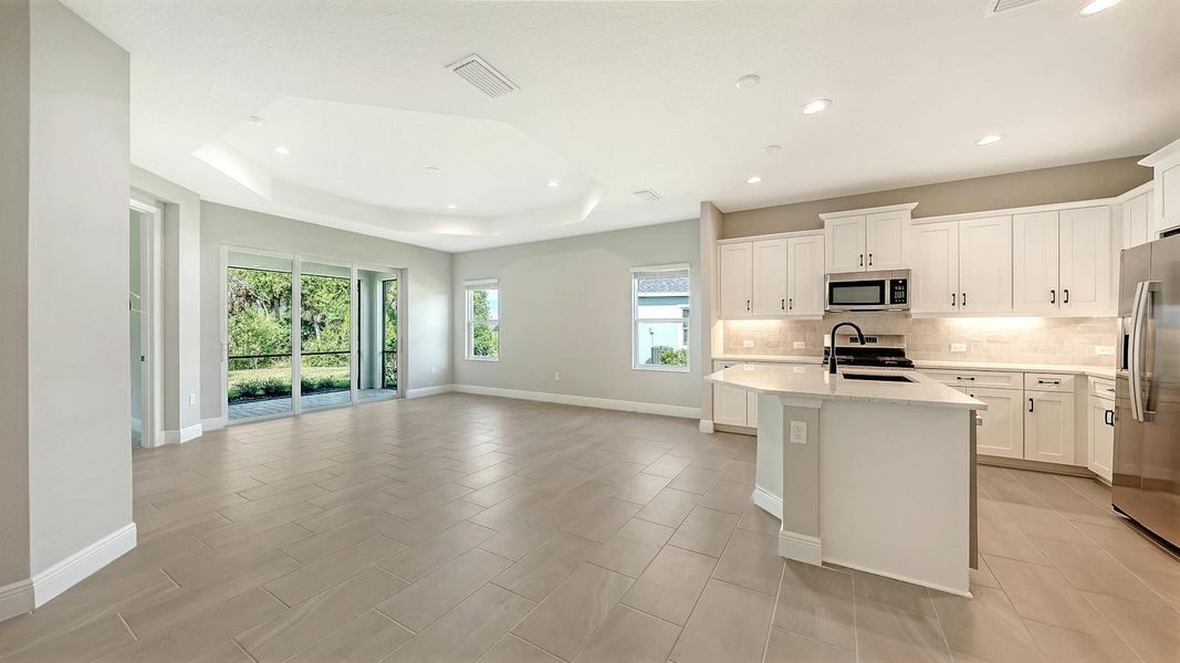 Spacious, unfurnished interior of a new home in Wildleaf Real Estate and Homes for Sale in Parrish, FL - Neal Communities, Parrish (Image 15).