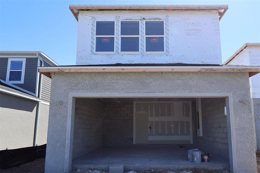 In-progress construction of a new home in Center Lake on the Park, St. Cloud, FL (Image 10).