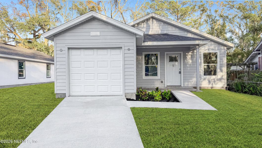 Front exterior of a new home in , Jacksonville, FL, highlighting curb appeal (Image 1). Front exterior of a new home in , Jacksonville, FL, highlighting curb appeal (Image 1).