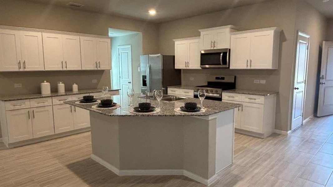 Furnished interior view inside a new home in Highlands at Chapel Creek, Fort Worth (Image 8). Furnished interior view inside a new home in Highlands at Chapel Creek, Fort Worth (Image 8).